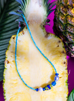 Bomba handcrafted necklace worn – surf-inspired beach jewelry from Tortola – Low Tide LA