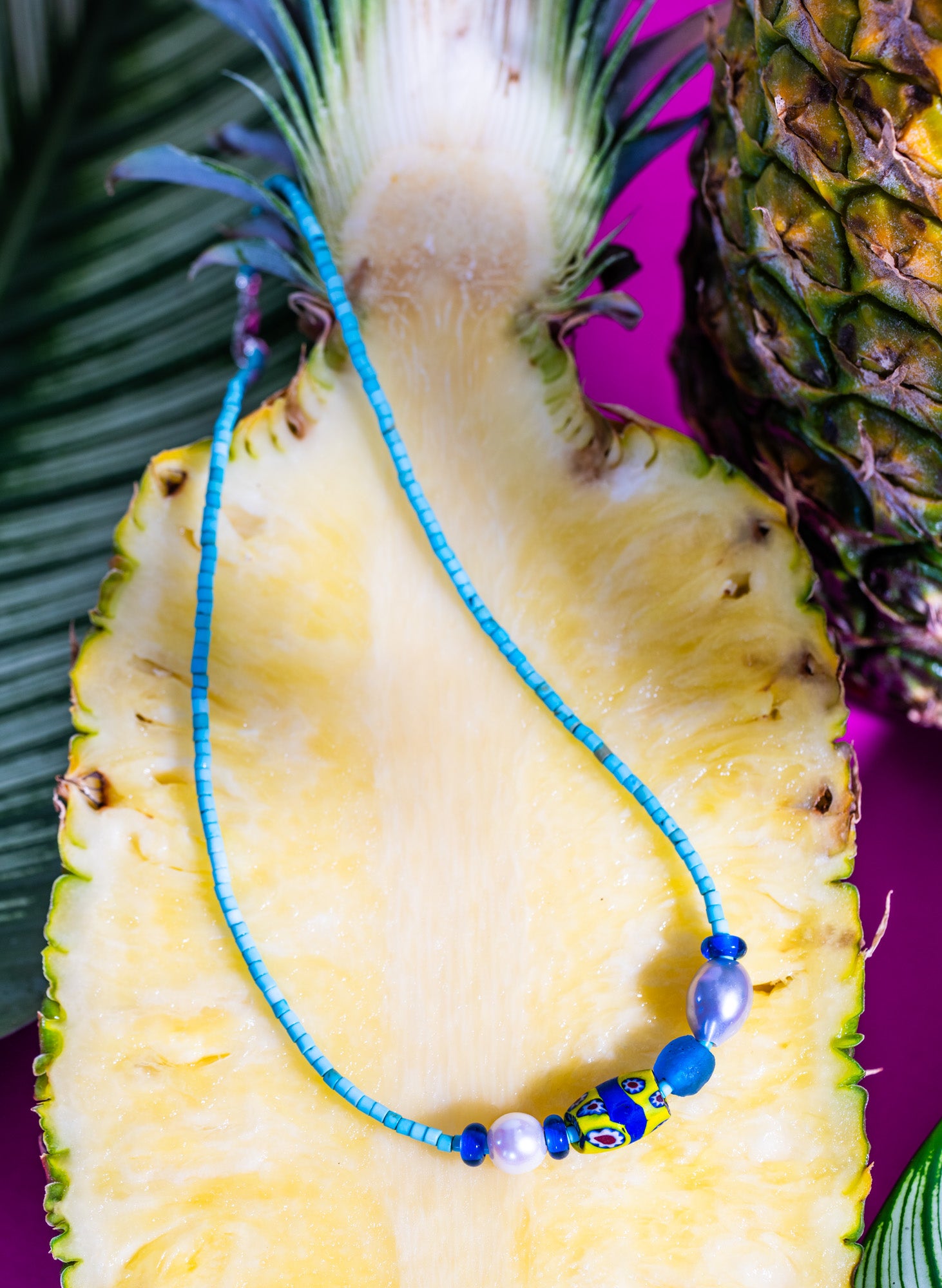 Bomba handcrafted necklace worn – surf-inspired beach jewelry from Tortola – Low Tide LA