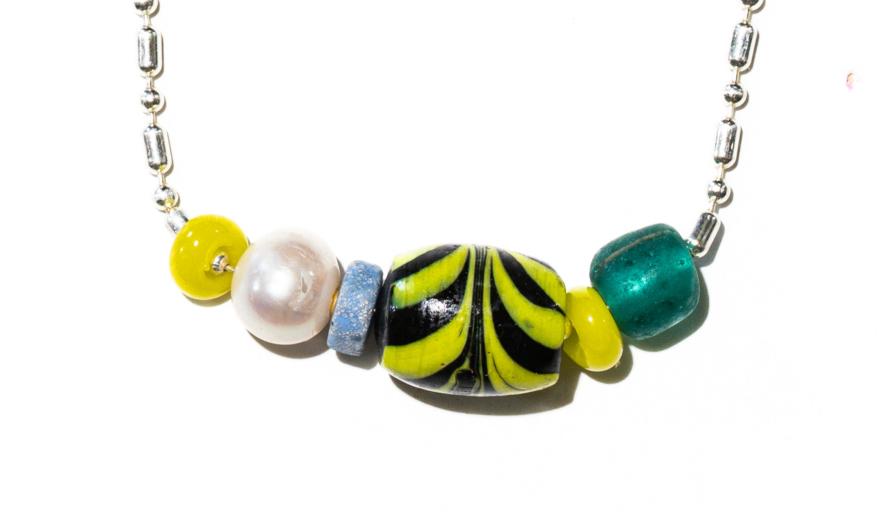 Bahia SS necklace close-up – African bead and pearl detail on sterling silver chain – Low Tide LA